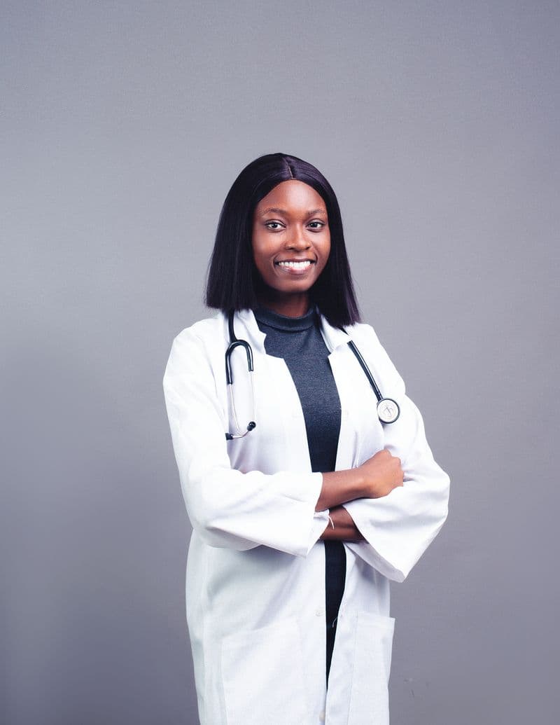 Portrait of Dr. Yvette Boateng, MD, FAAP, in a white coat with a stethoscope